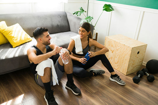 A couple after a workout in their home gym