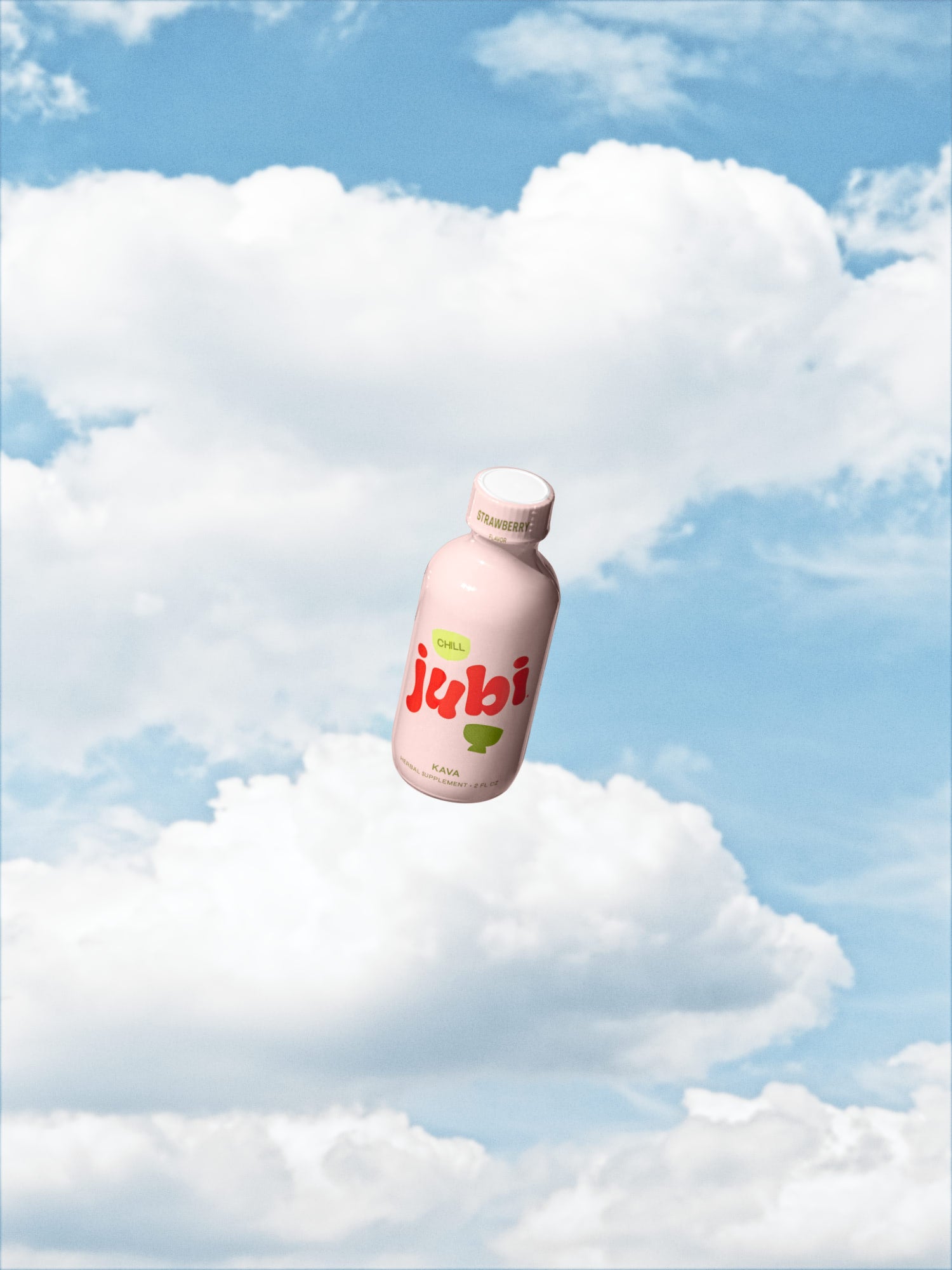 Jubi Strawberry kava shot floating against cloudy sky.